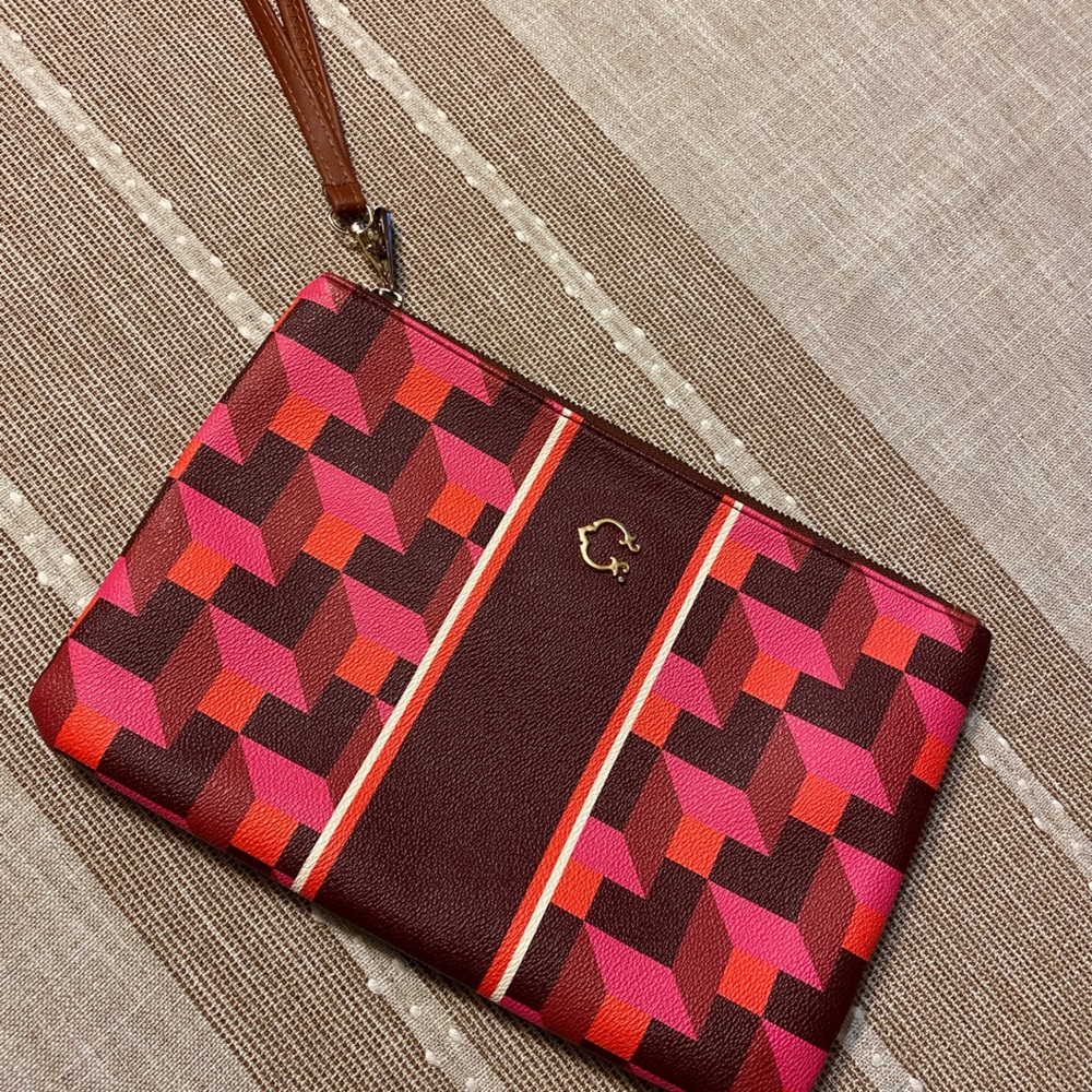 C. Wonder Pink Wristlet Zippered Pouch